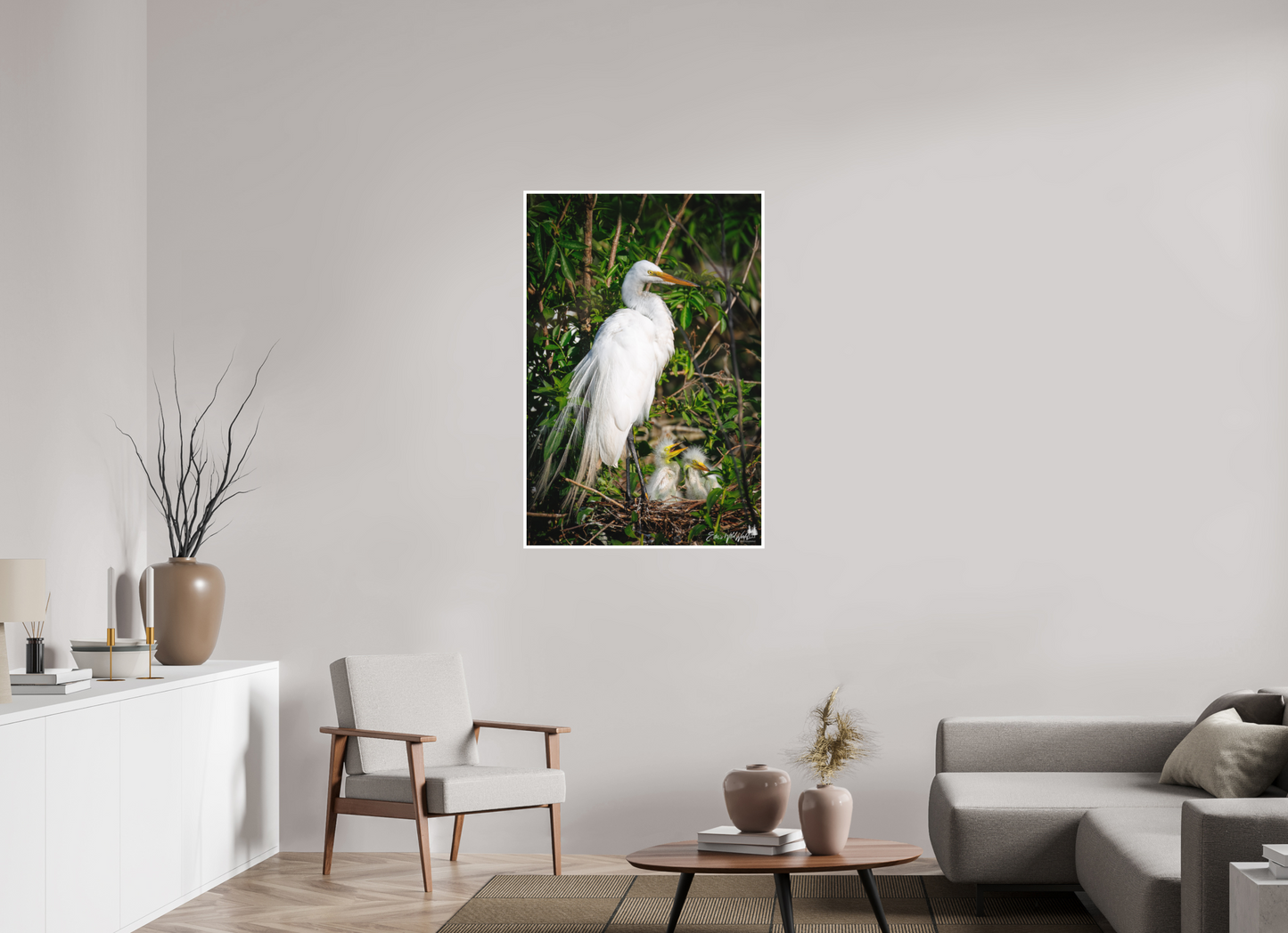 Great egret with chicks