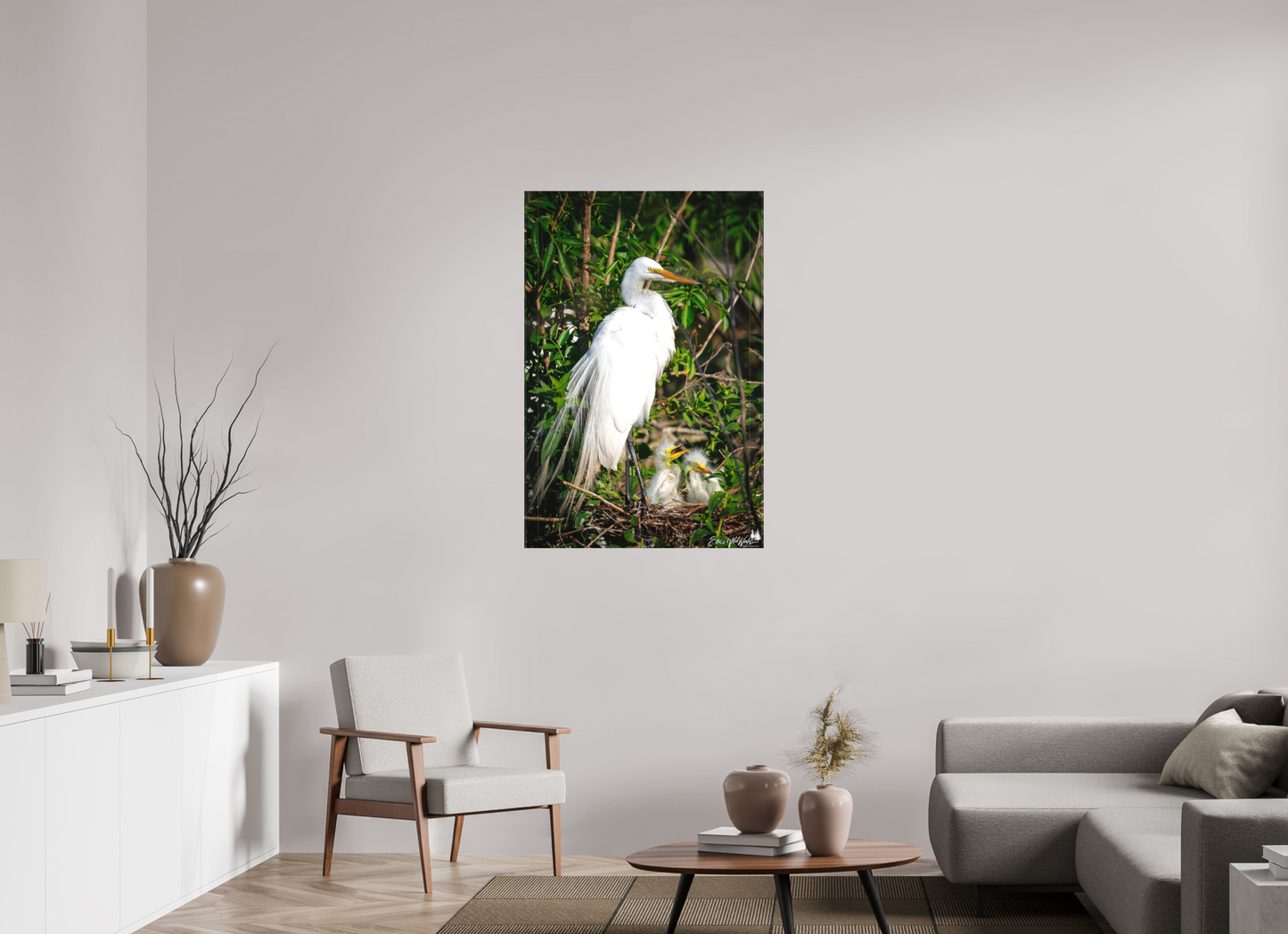 Great egret with chicks